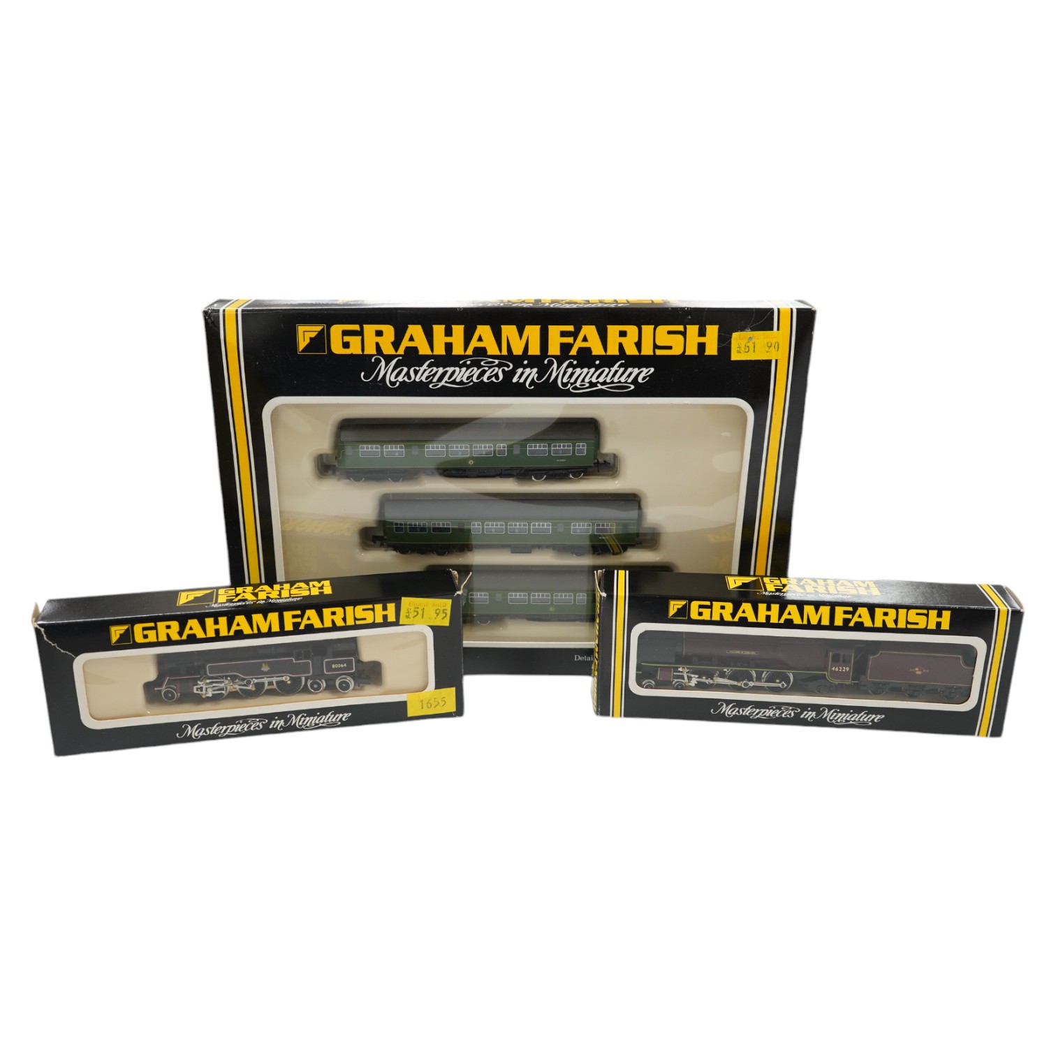 Three boxed Graham Farish N gauge railway BR locomotives; a Coronation Class 4-6-2 (1816), a Class 4MT 2-6-4T (1655), and a 3-car DMU (8143). Condition - good.